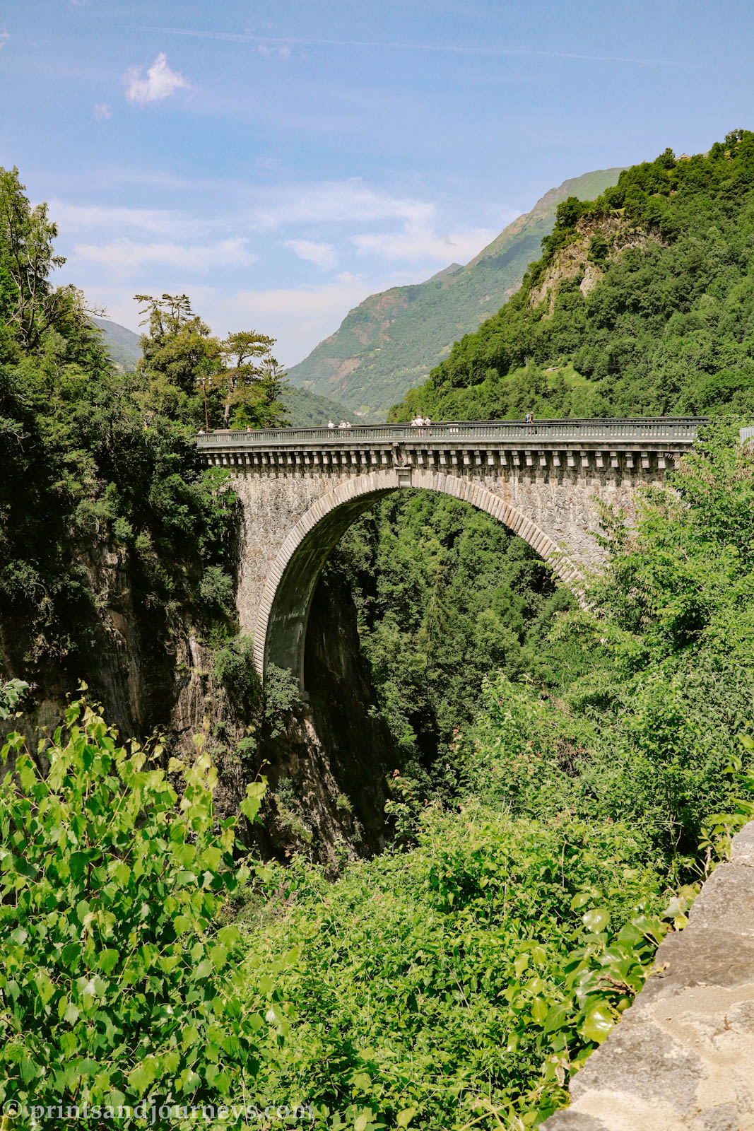 Pont Napoleon bridge poised over a lush green valley