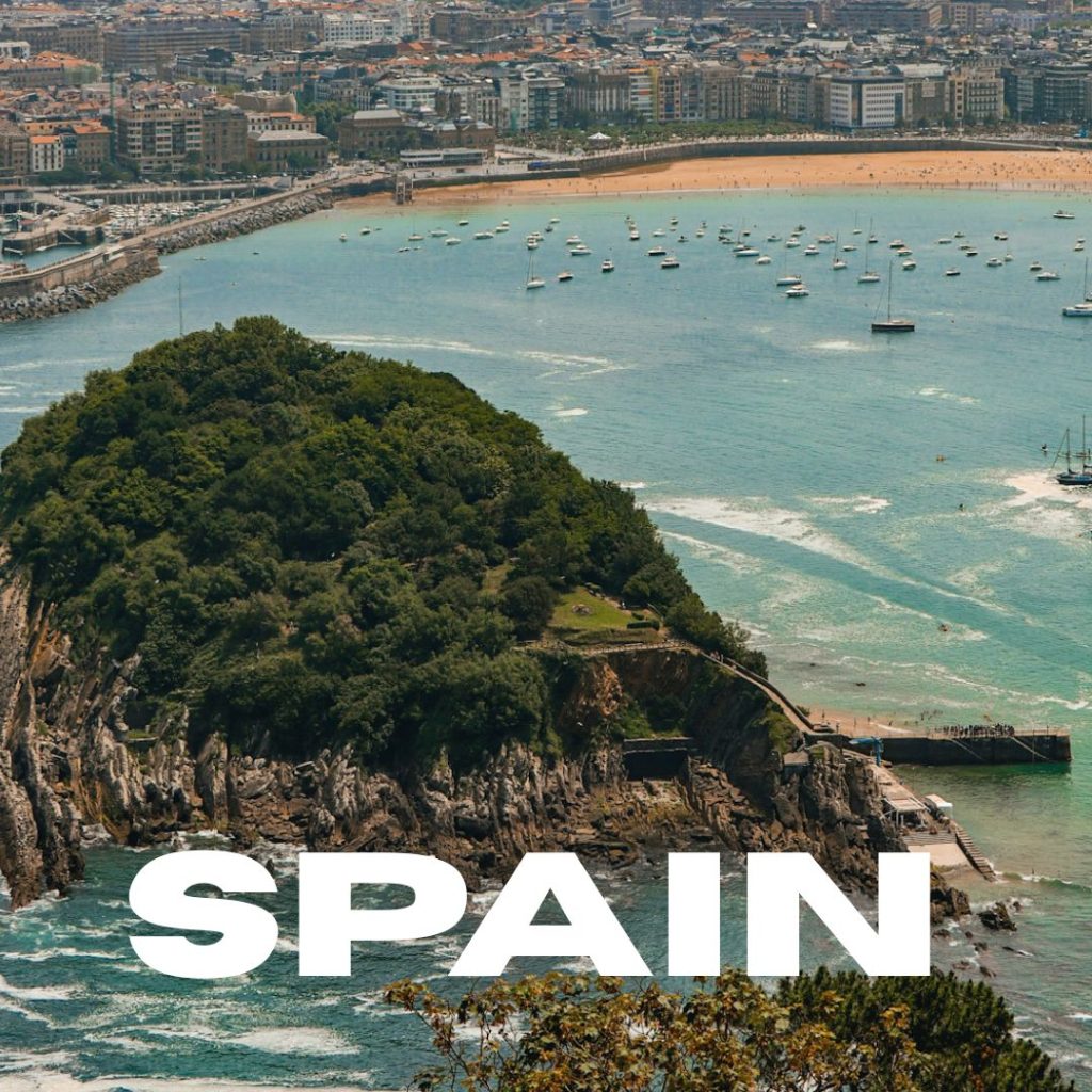 photo of ocean with text overlay saying spain