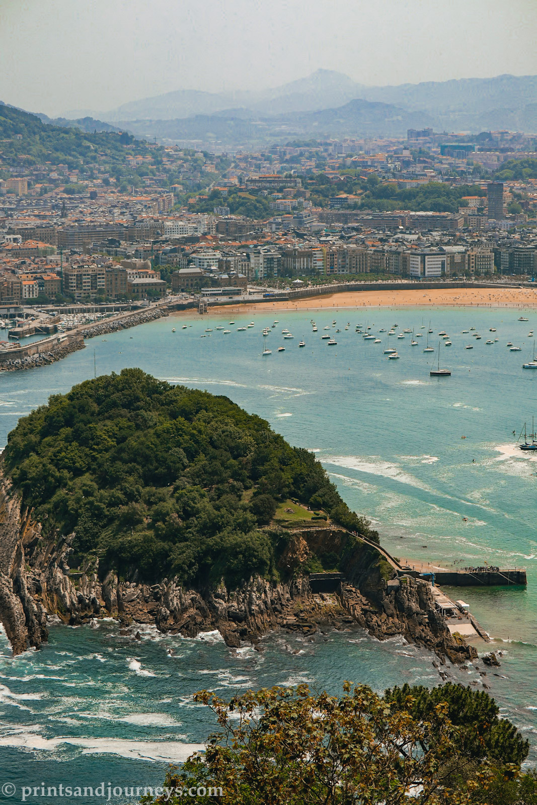photo of the ocean, san sebastian and santa clara island from monte igueldo viewpoint